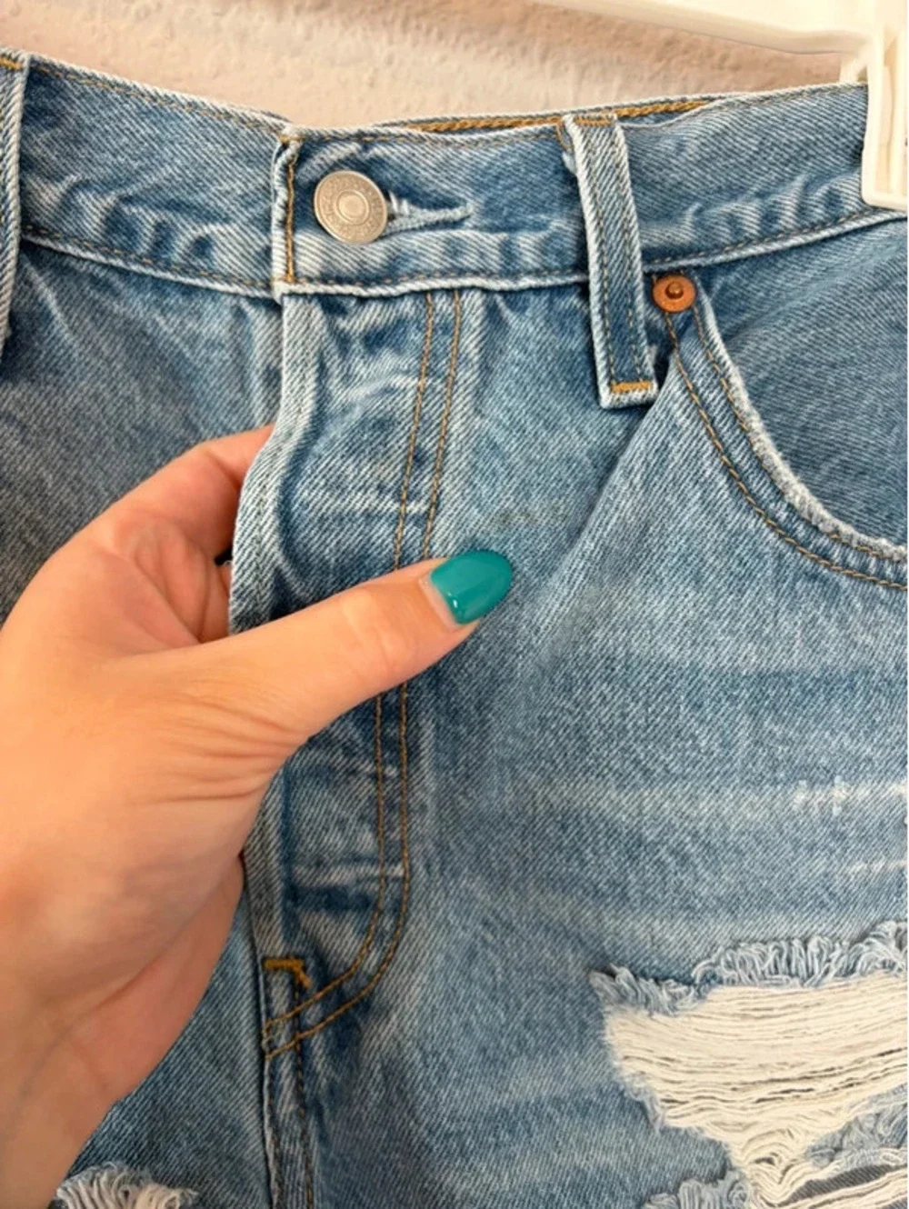 Levi's 501 light wash shorts size W31. 2.5in inseam. Spot on front